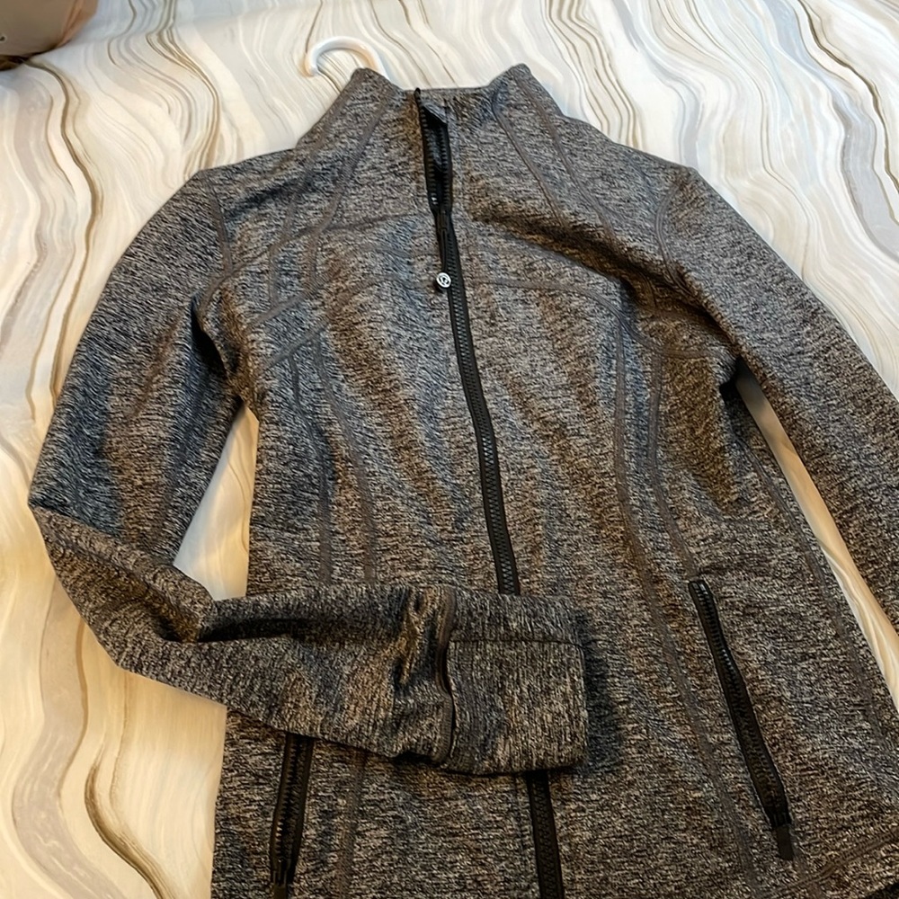 Cute fitting athletic jacket. Great for everyday.